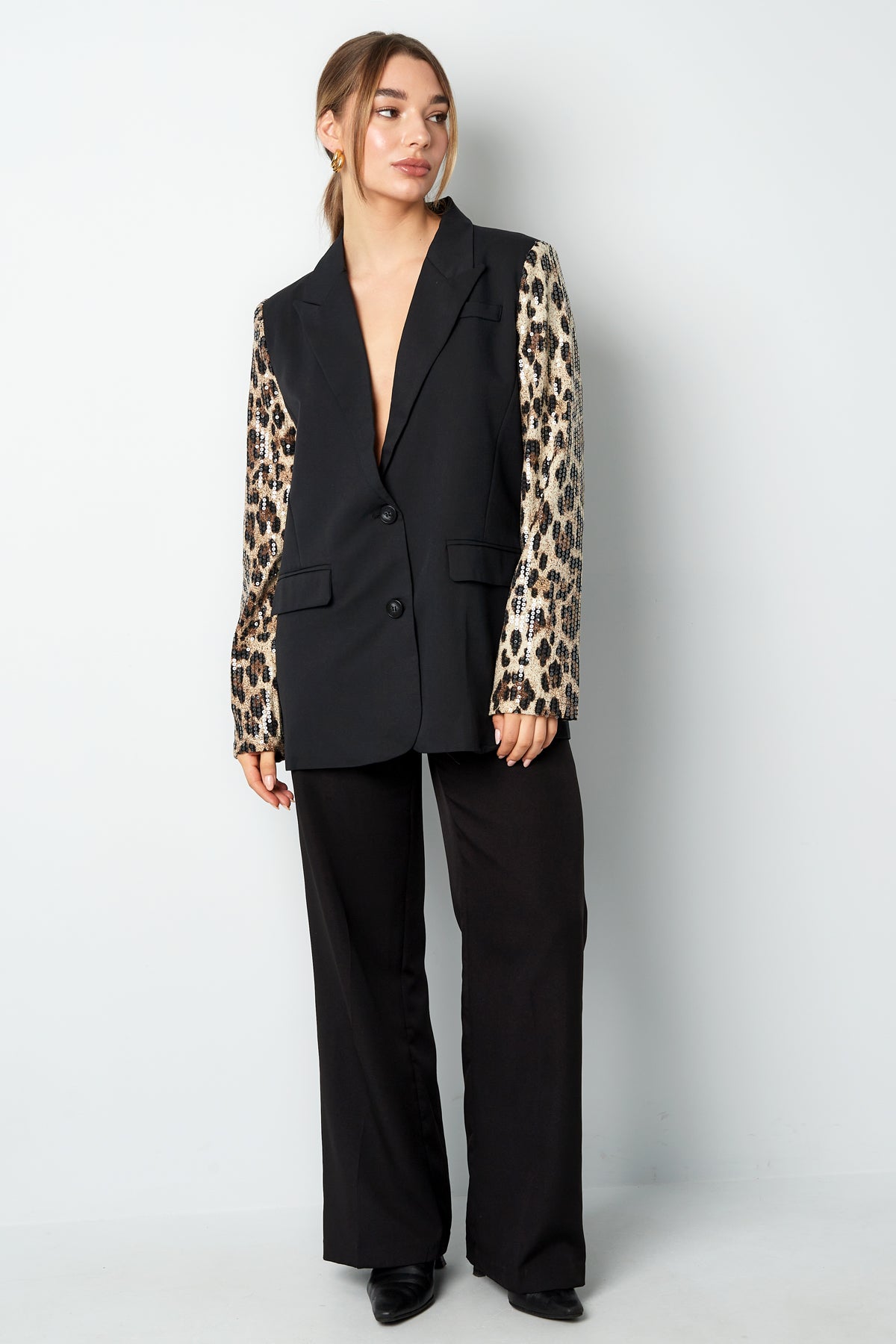 Blazer met panterprint glitter mouw