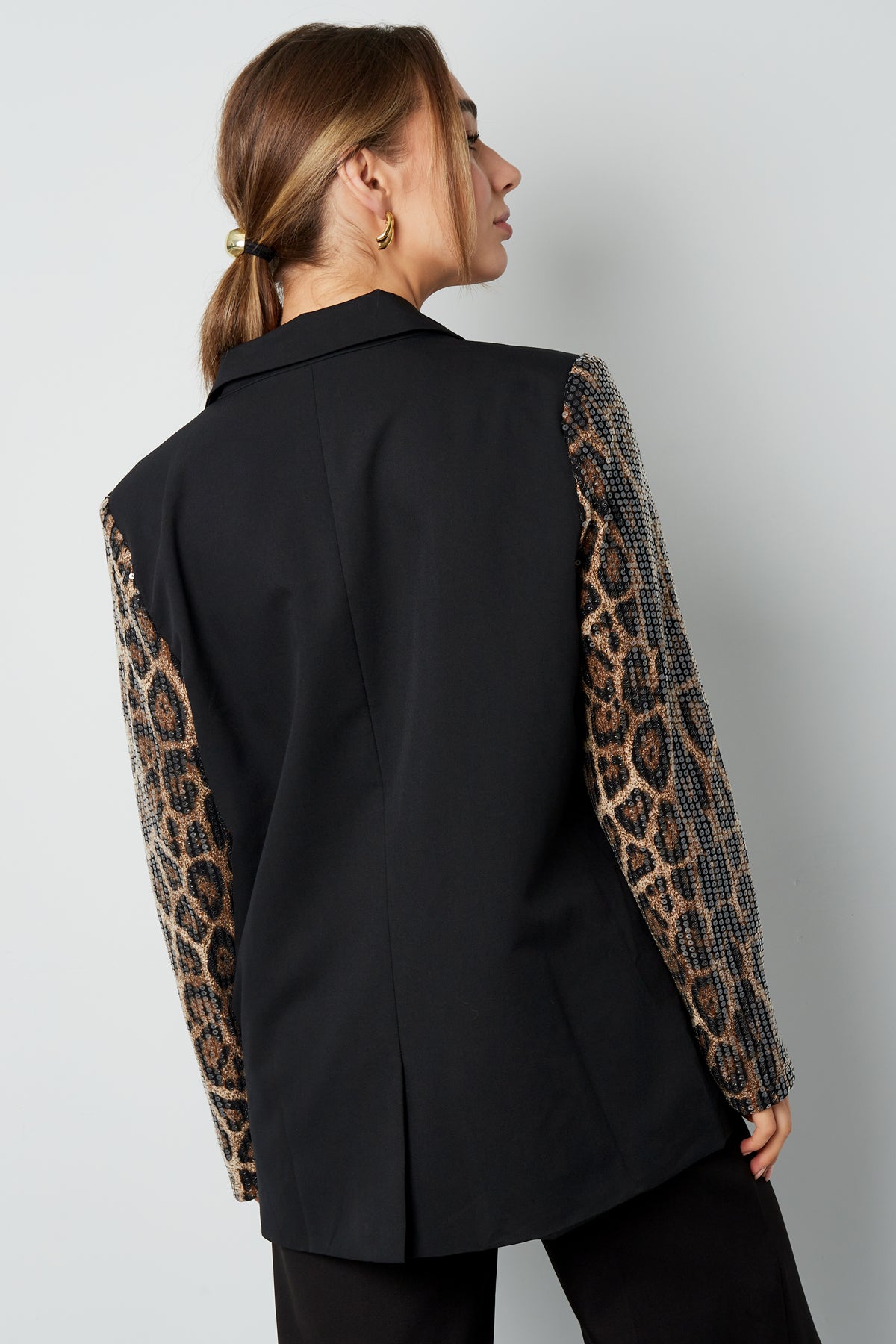 Blazer met panterprint glitter mouw