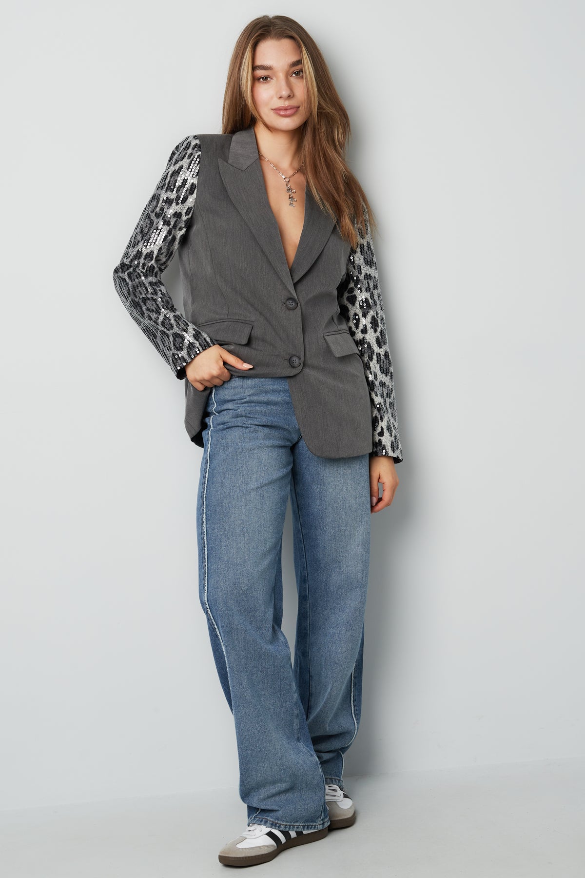 Blazer met panterprint glitter mouw