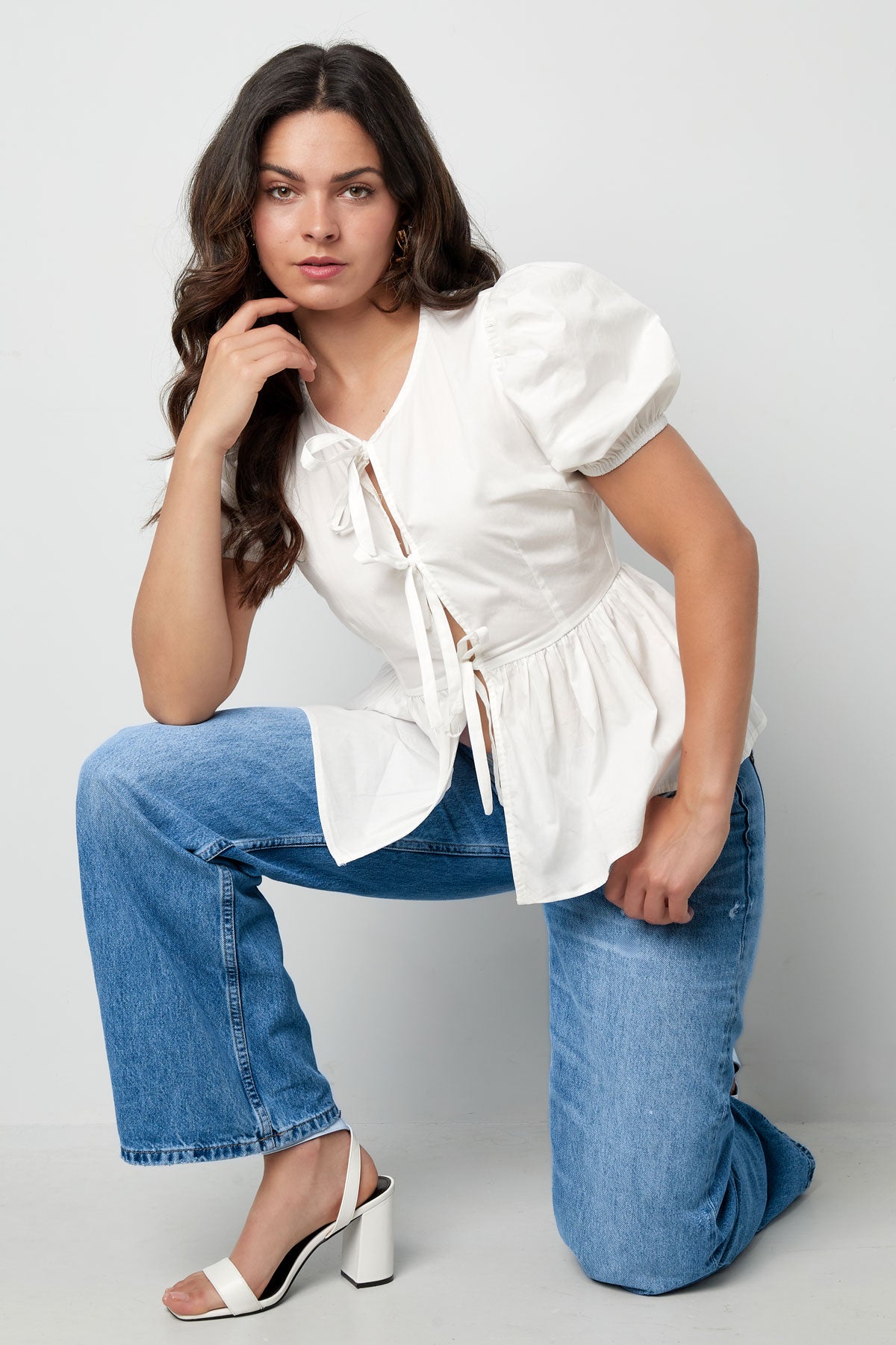 Musthave peplum blouse met strikjes