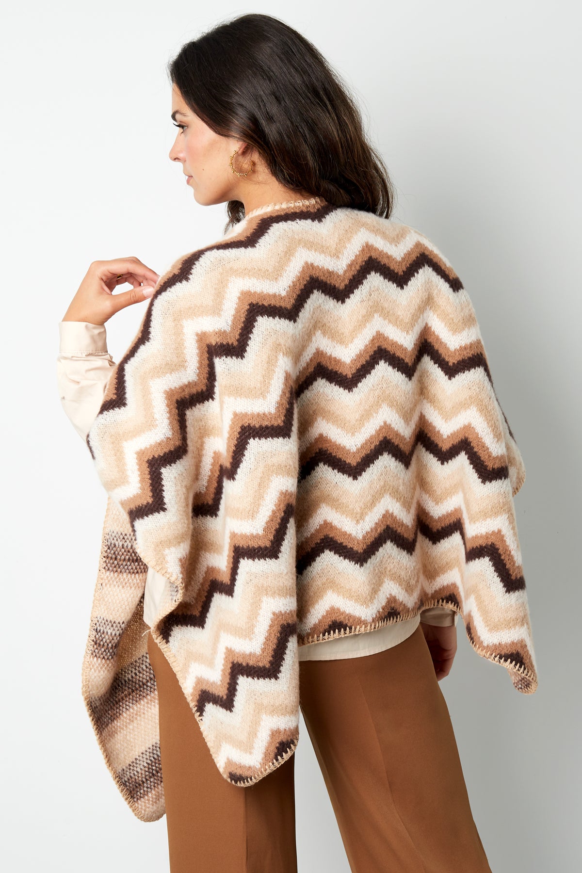 Winter poncho wrapped in warmth