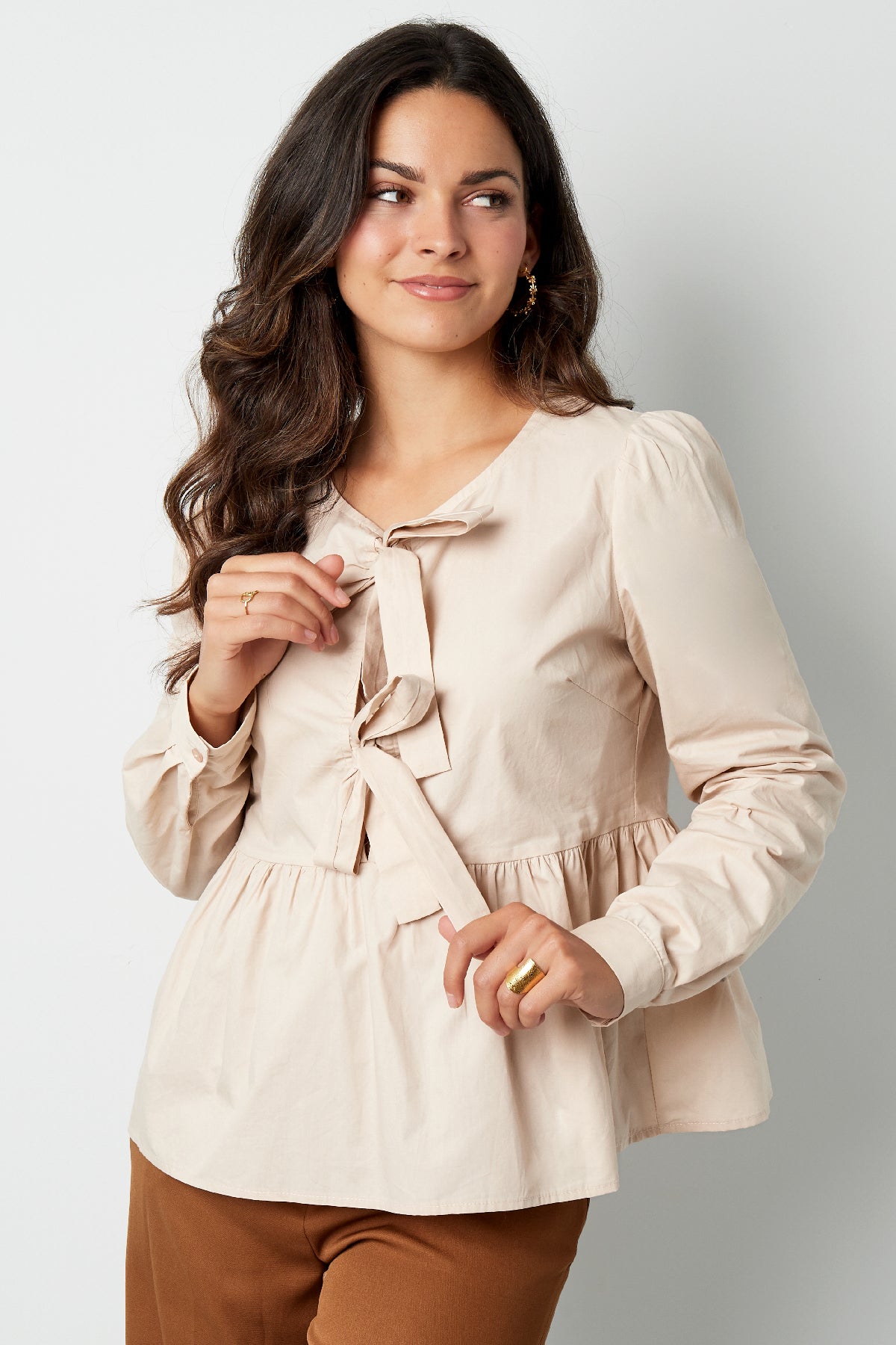 Longsleeve peplum top met strikjes