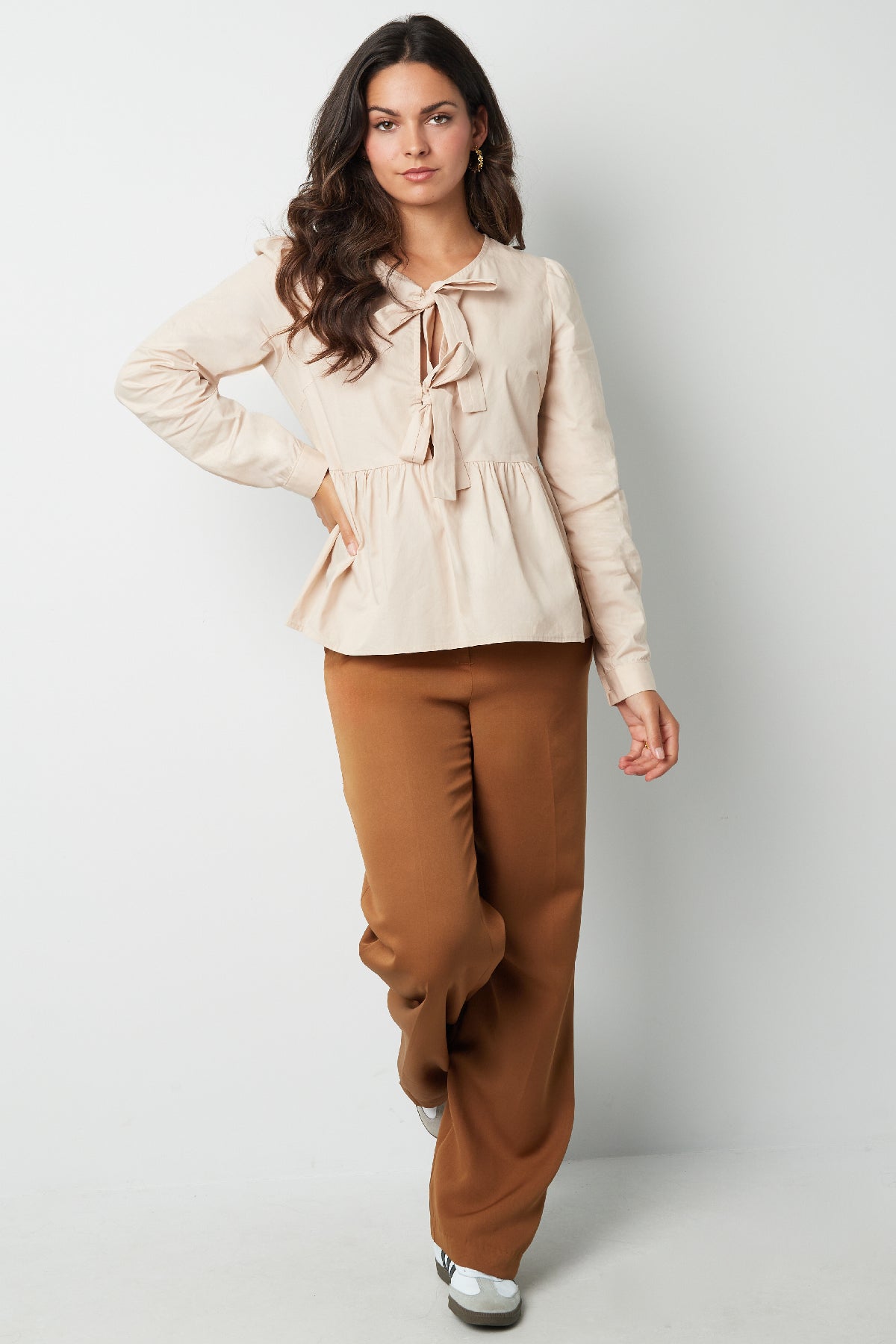 Longsleeve peplum top met strikjes