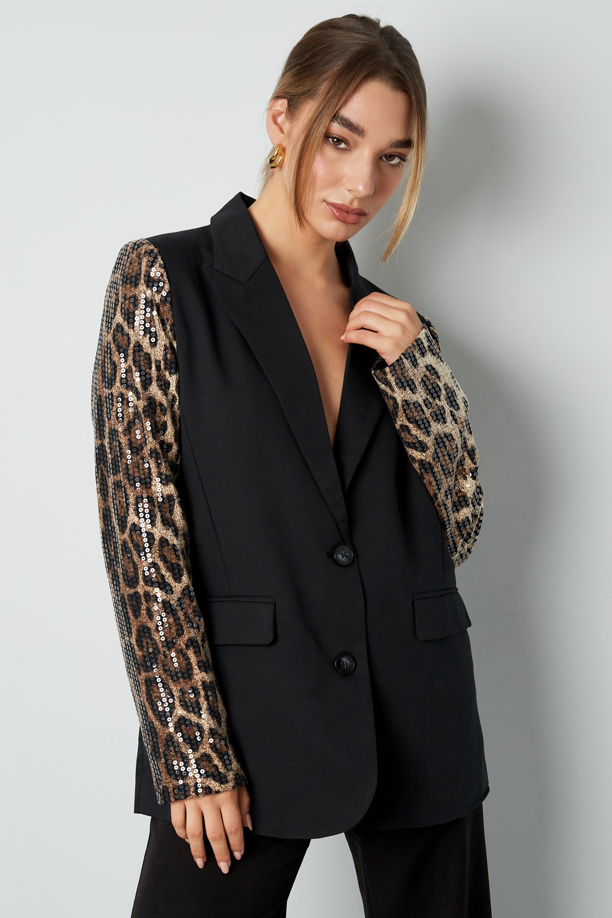 Blazer met panterprint glitter mouw